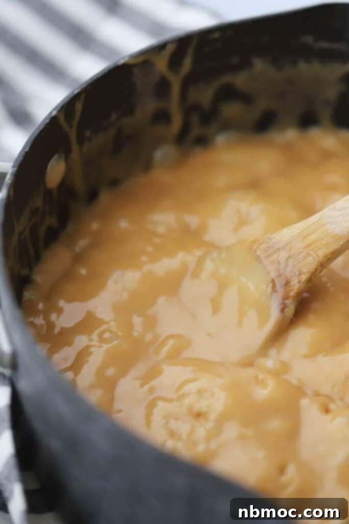 Caramel in a pot for making candy with chocolate and caramel.