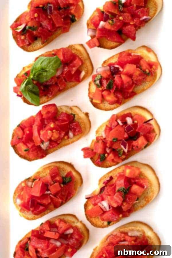 Fresh Tomato and Basil Bruschetta arranged on a serving platter, adaptable for a red, white, and blue theme.