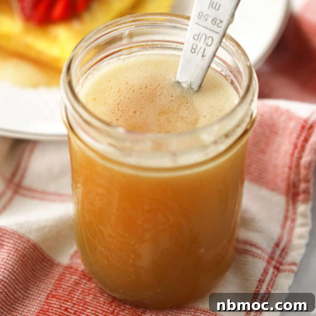 Velvety Buttermilk Syrup Perfection 4 A mason jar full of golden homemade buttermilk syrup.