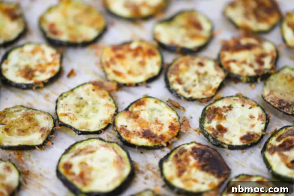 Baked Zucchini Chips on a baking sheet. 