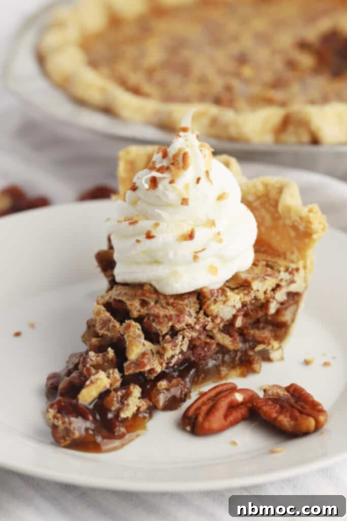21+ Decadent Caramel Dessert Recipes 17 A perfectly baked caramel pecan pie, showcasing its rich, nutty filling and golden crust.