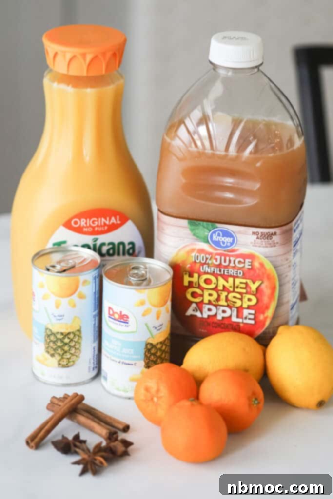 Winter's Spiced Brew 3 Ingredients for making this wassail drink recipe, including orange juice, apple juice, pineapple juice, and citrus.