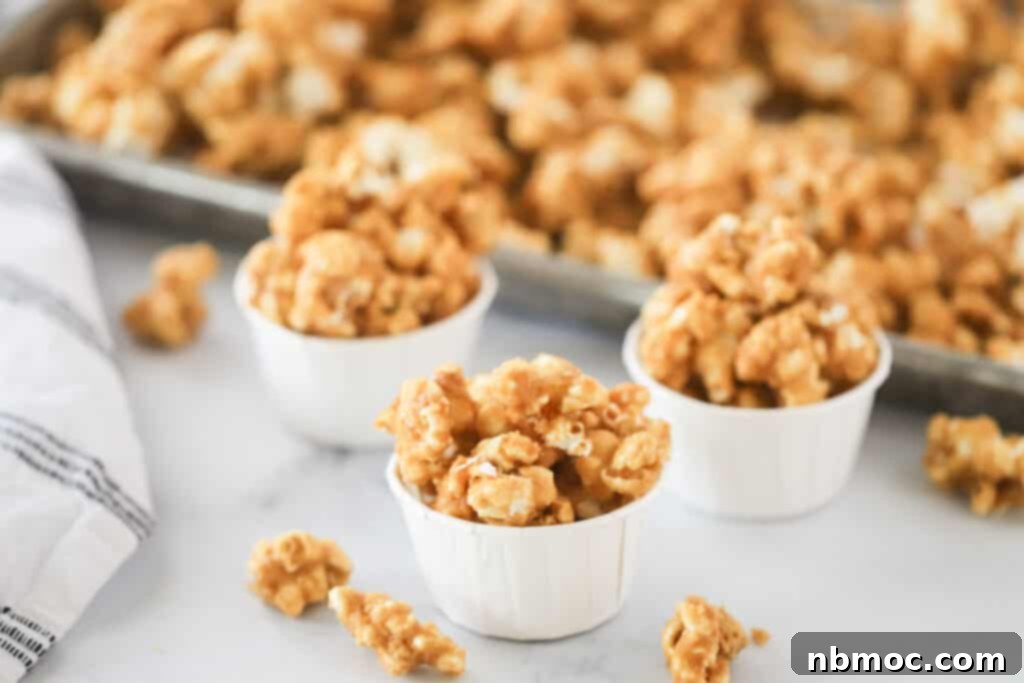 Small individual cups full of CrackersJacks. It's an easy crackerjack popcorn recipe that everyone will love.