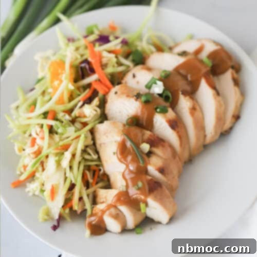 A vibrant close-up of perfectly grilled Thai chicken, glistening with marinade and ready to be served, capturing the essence of 'thai chicken marinade' and 'chicken thai marinade' recipes.