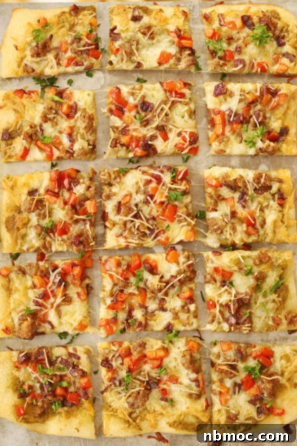 Ultimate Pesto Sausage Flatbread 4 homemade sausage flatbread pizza with pesto. Homemade flatbread recipe.