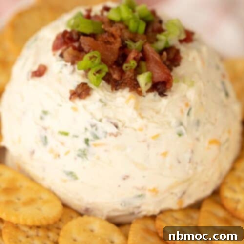 Bacon Ranch Cheese Ball: A delicious and easy appetizer recipe featuring creamy cheese, crispy bacon, and zesty ranch seasoning.