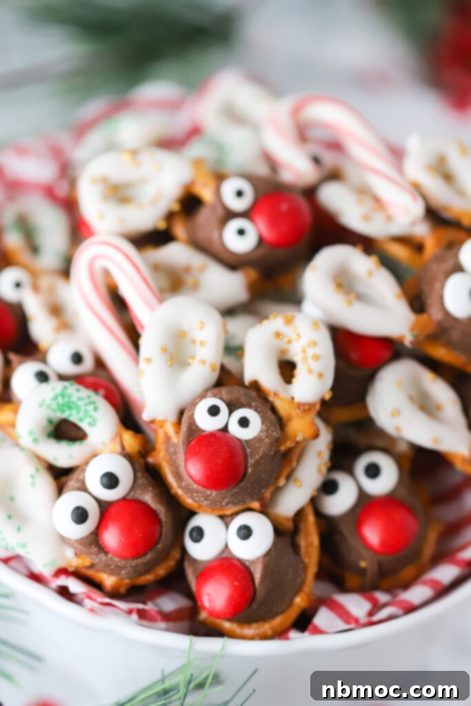 Holiday Antler Pretzels 5 A plate full of pretzels decorated to look like reindeer, a perfect holiday treat.