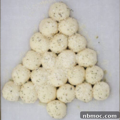 Garlic Butter Christmas Tree Rolls 5 Delicious homemade Garlic Pull-Apart Rolls shaped into a Christmas tree. Perfect for holiday gatherings, these cheese-stuffed rolls are soft, fluffy, and full of flavor.