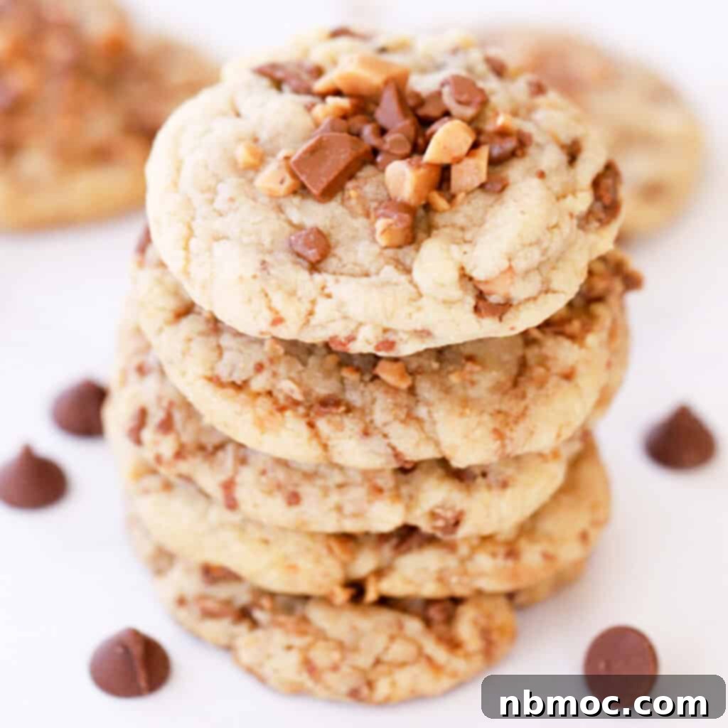 heath toffee cookies on parchment paper