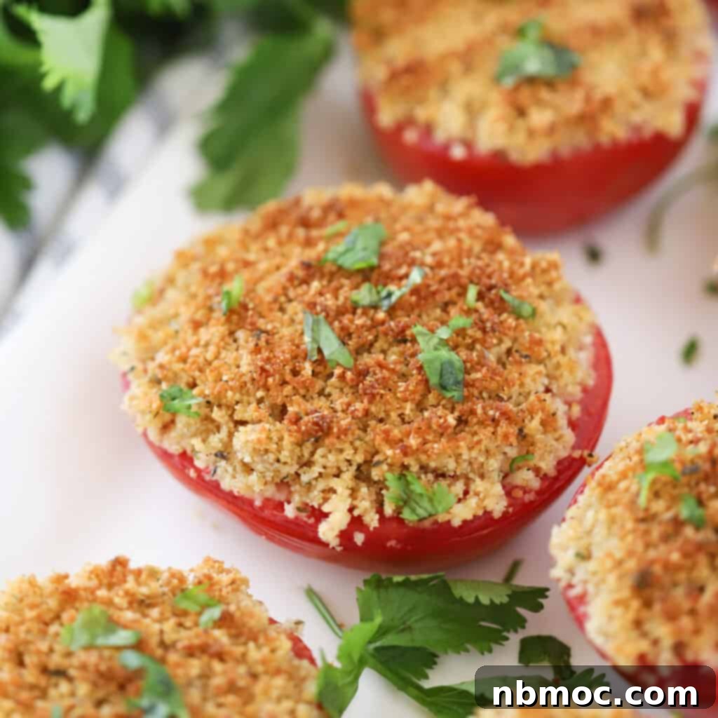 Valentines Day Dinner Inspiration 17 Beautifully baked tomato halves, generously topped with a golden panko Parmesan crust, making for a savory and simple side dish.
