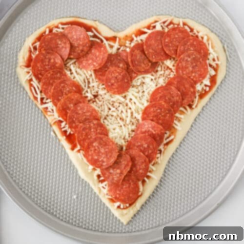 Heartwarming Pizza 6 heart shaped pizza, how to make heart shaped pizza, homemade pizza recipe.