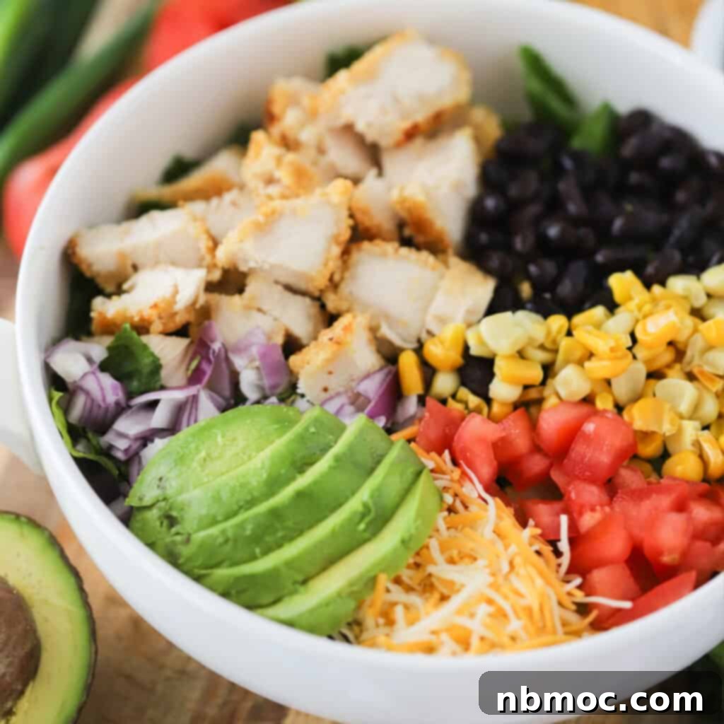 Fiesta Crispy Chicken Salad 5 A beautifully arranged Southwest Crispy Chicken Salad bowl, ready to be enjoyed.