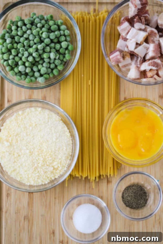 Ingredients to make this Spaghetti Carbonara recipe in separate bowls. 