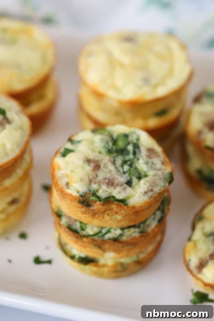 Protein Egg Bites with Cottage Cheese stacked on a serving plate.