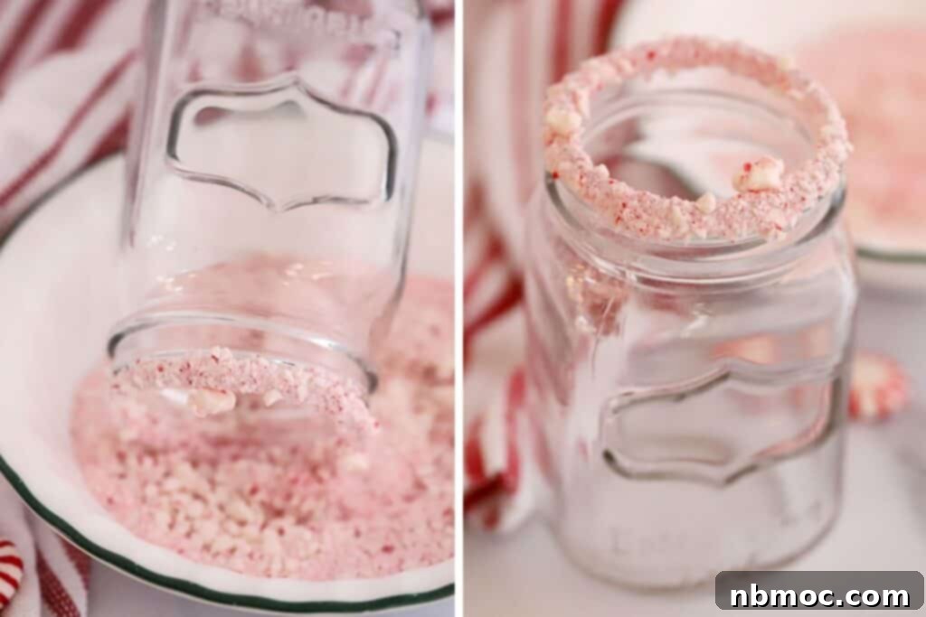 Close-up of crushed peppermint candies adhered to the rim of a mason jar, perfect for decorating hot chocolate or other festive drinks.