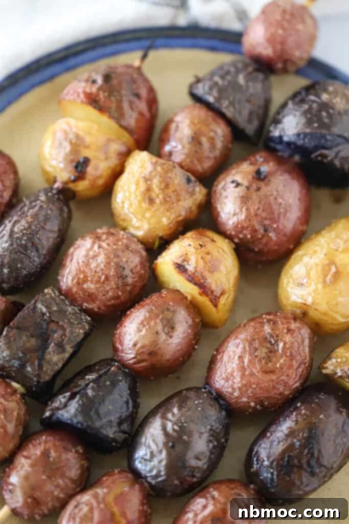 Flame-Kissed Russet Potatoes 2 How to cook russet potatoes on the grill using kabob skewers.