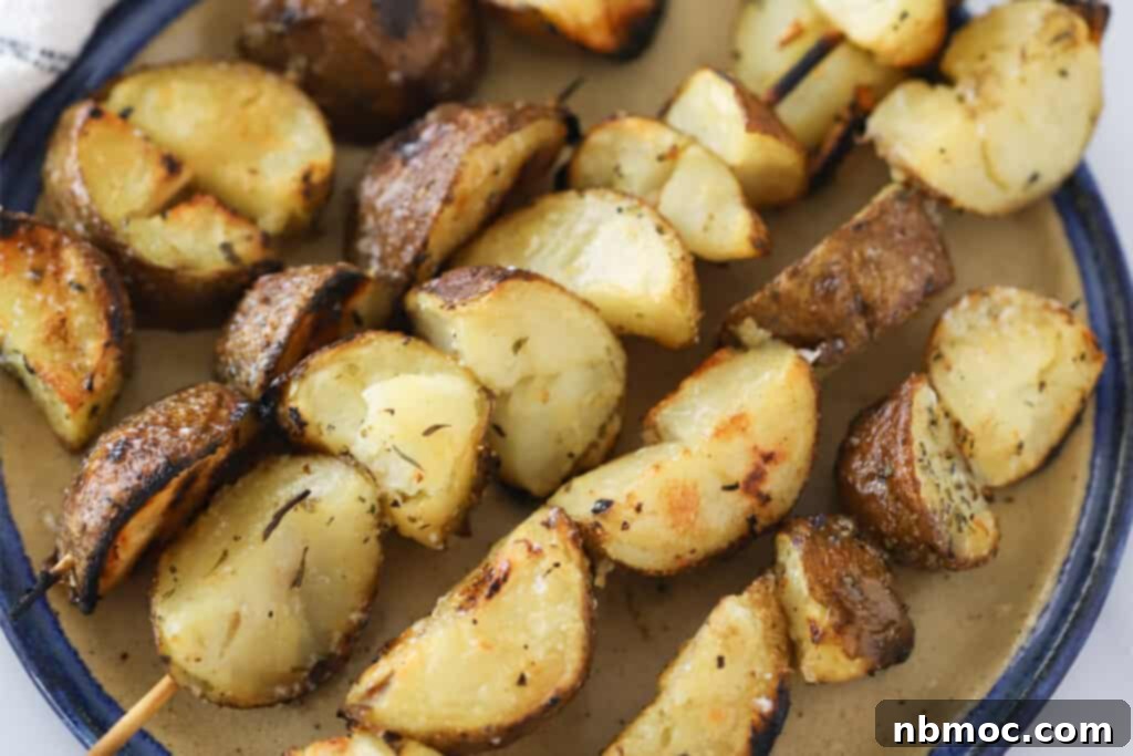 Flame-Kissed Russet Potatoes 4 Rustic potatoes on skewers grilled to perfection.