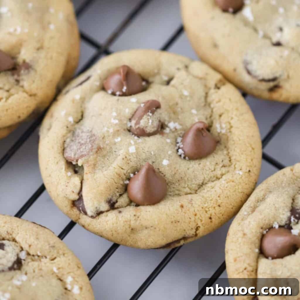 How to make the best brown butter chocolate chip cookies: fresh ingredients laid out on a wooden surface.