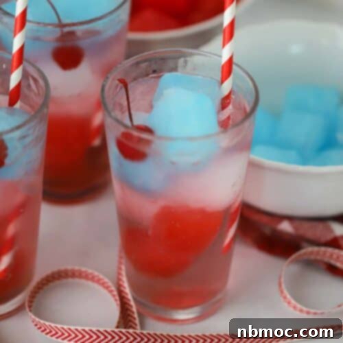 red white and blue punch in a glass