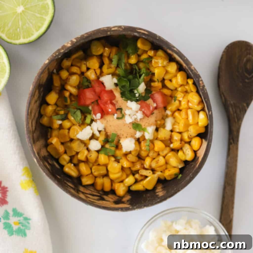 Authentic Mexican Street Corn (Esquites) served off the cob