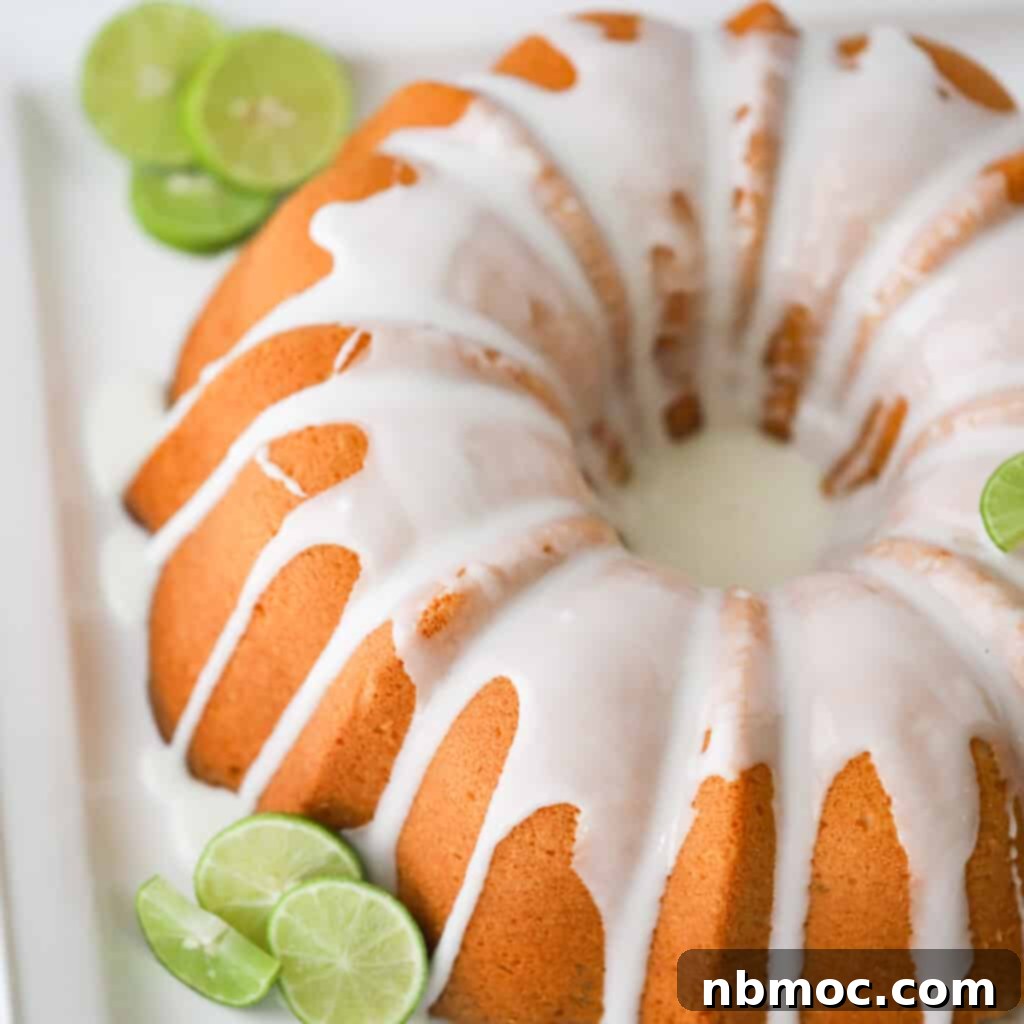 key lime pound cake recipe with limes on a serving platter
