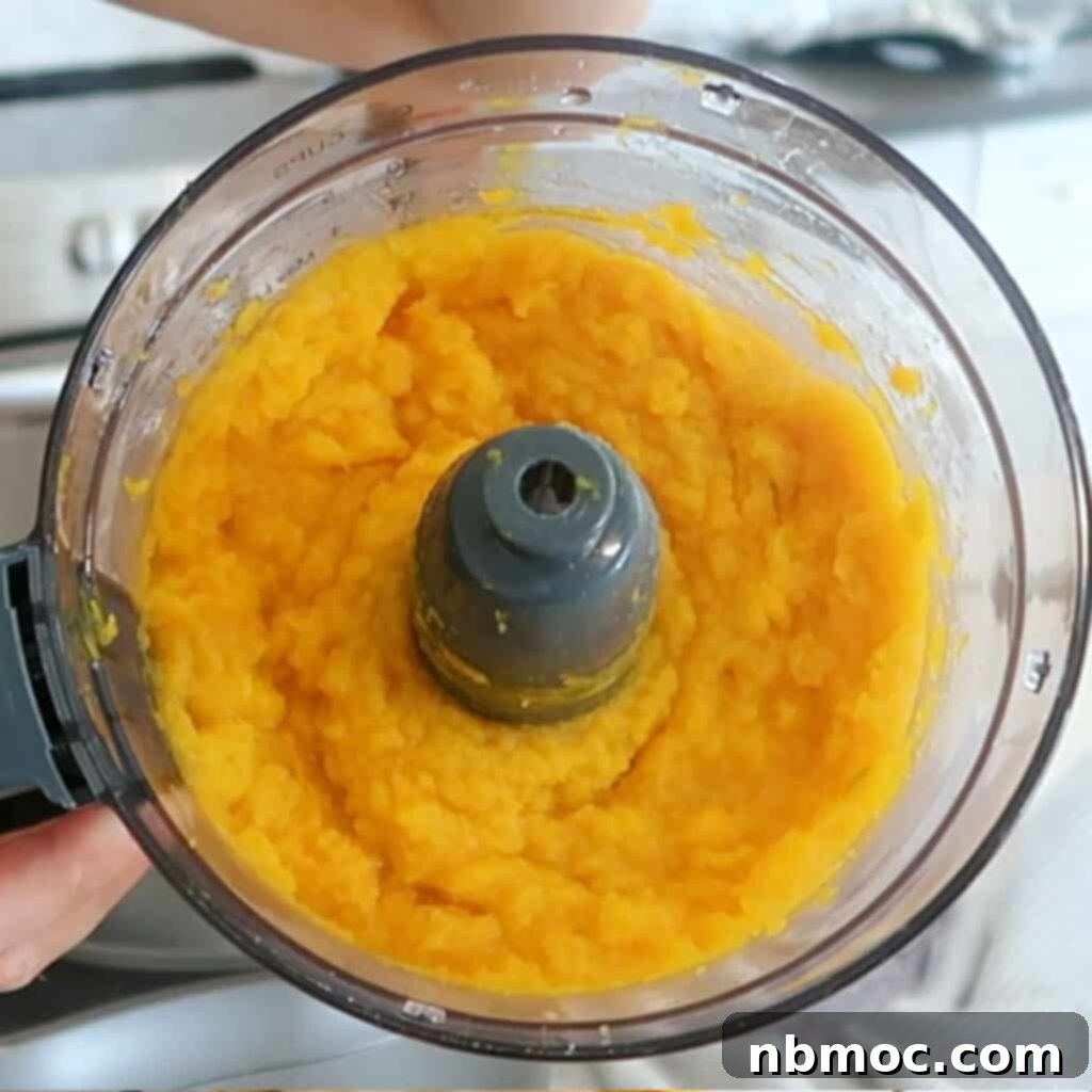 Irresistible Pumpkin Delights 24 Homemade pumpkin puree in a food processor.