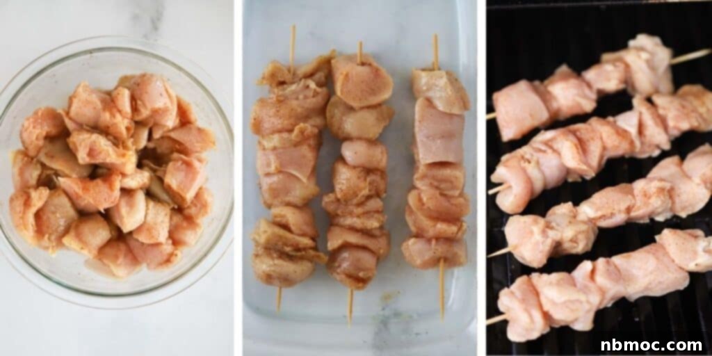 Marinating bang bang chicken being added to wooden skewers, ready for grilling.