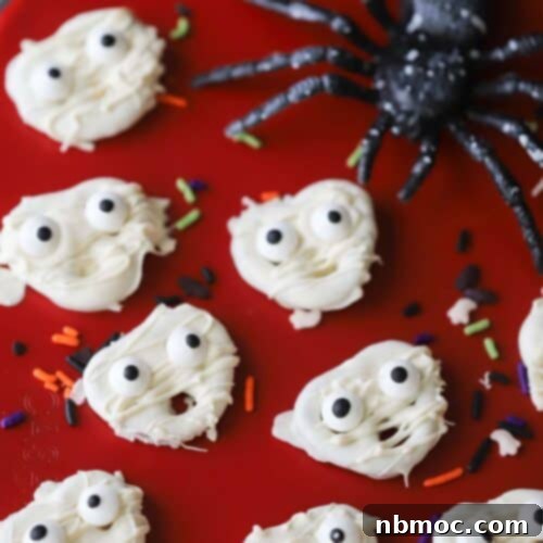 Little mummy pretzels decorated with candy eyes