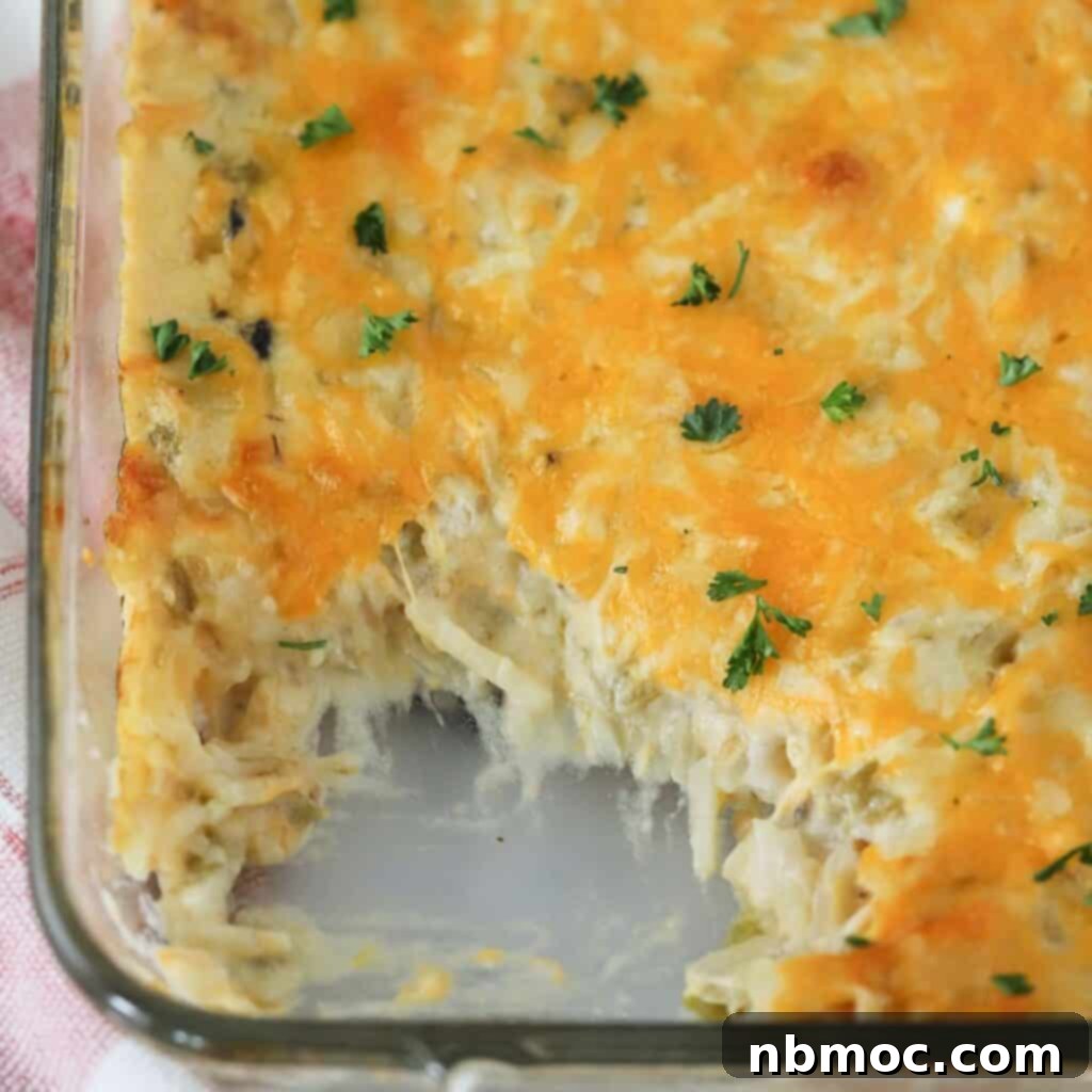 how to make spicy cheesy poratoes, an easy cheesy potato casserole. A delicious serving of spicy cheesy potatoes on a plate, ready to enjoy.