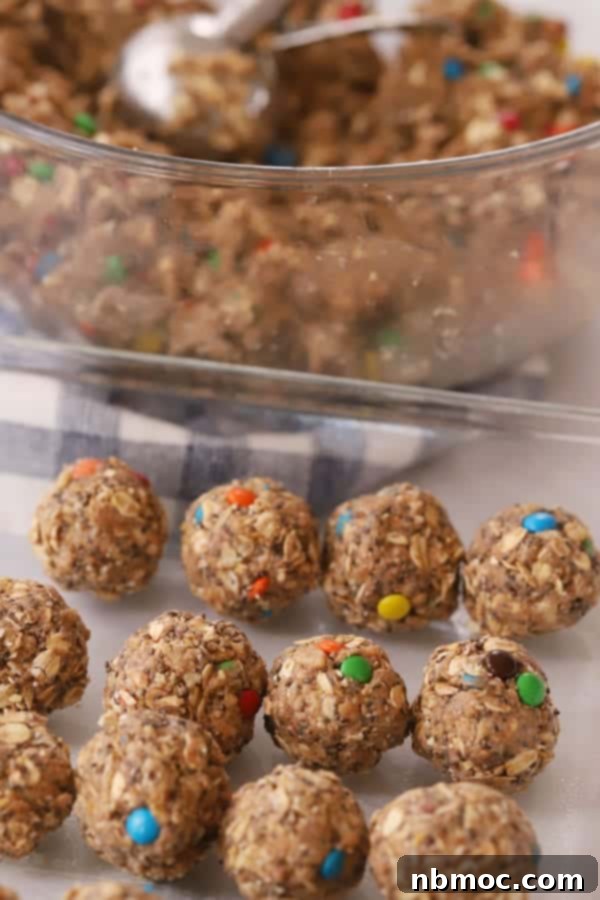 Quick & Healthy Chia Oat Energy Bites 5 Chia power balls in a glass baking dish.
