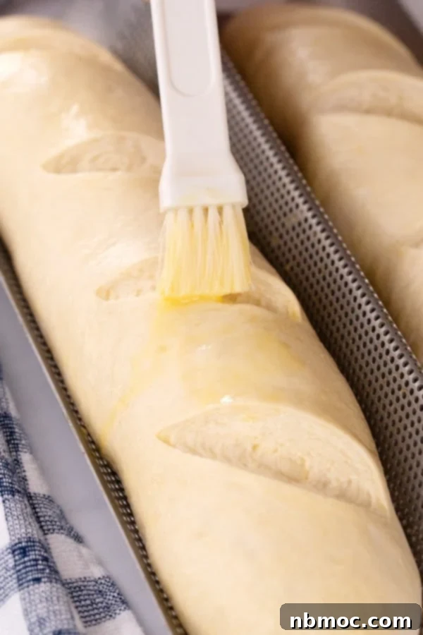 Egg wash brushed on french bread dough.