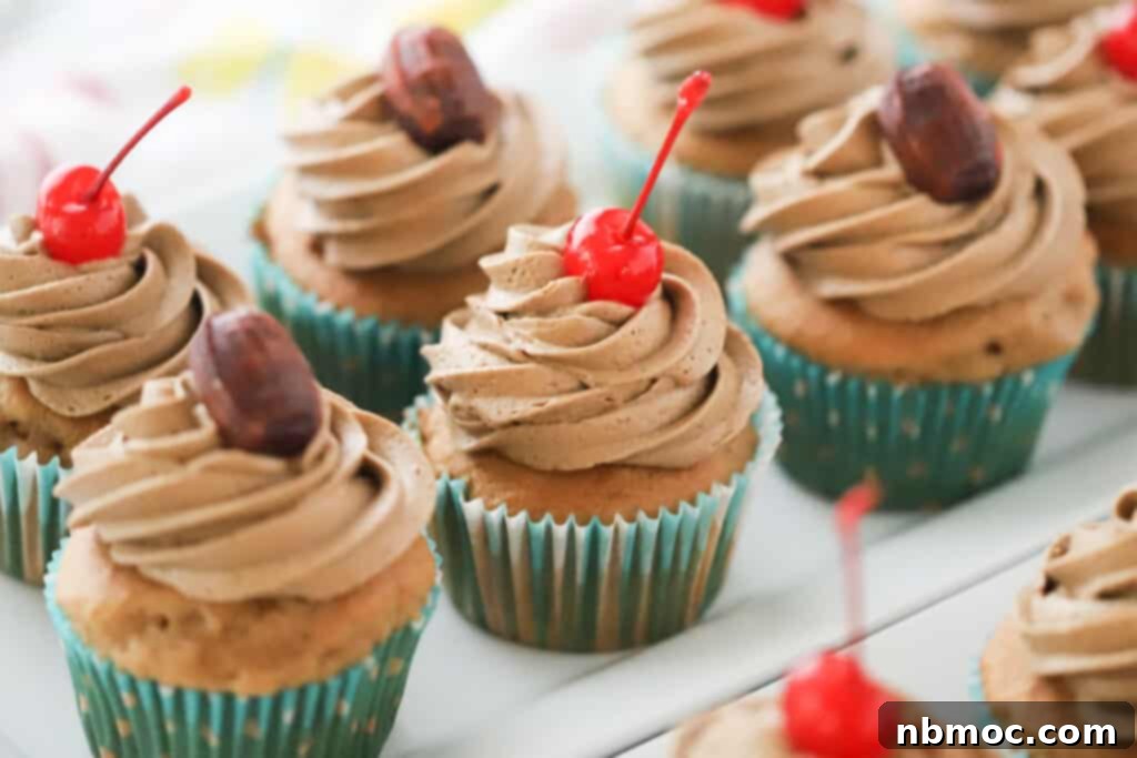 Frothy Root Beer Cupcakes 4 Delicious root beer cupcakes, topped with piped root beer frosting and maraschino cherries.
