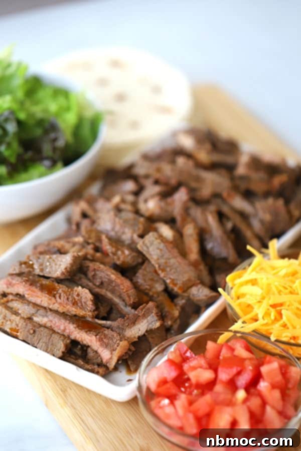 Carne Asada and Taco ingredients on a platter, showcasing a delicious chipotle carne asada recipe for burritos and tacos.