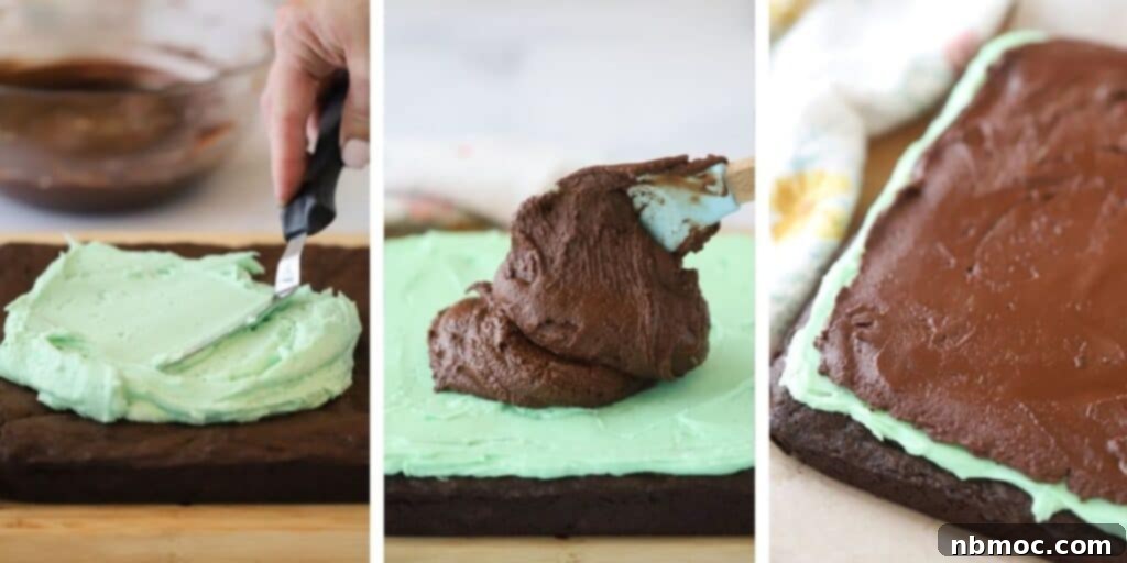 Spreading the mint chocolate frosting over the top of the brownie, then topping with chocolate ganache.