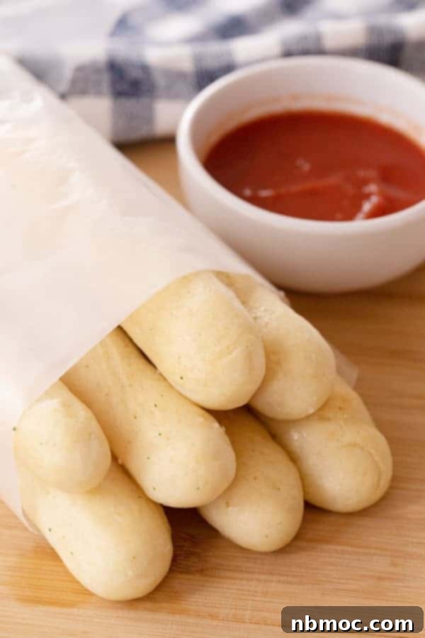 olive garden breadsticks recipe served with marinara sauce