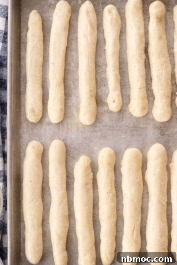 Copycat Olive Garden Breadsticks shaped and ready to bake. Breadsticks olive garden, olive garden garlic bread, olive garden breadstick.