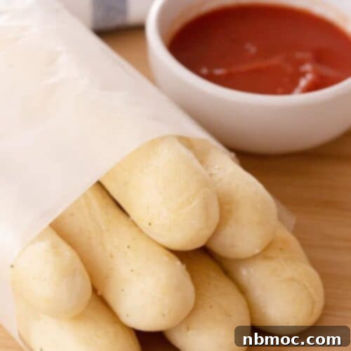 olive garden breadsticks recipe served with marinara sauce