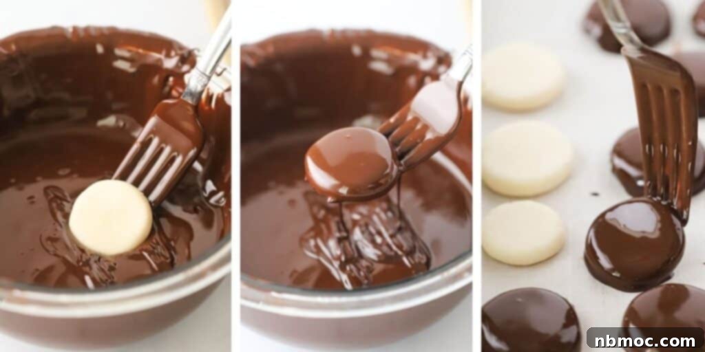 Detailed step-by-step image showing how to dip homemade peppermint patties in melted chocolate for a smooth coating.