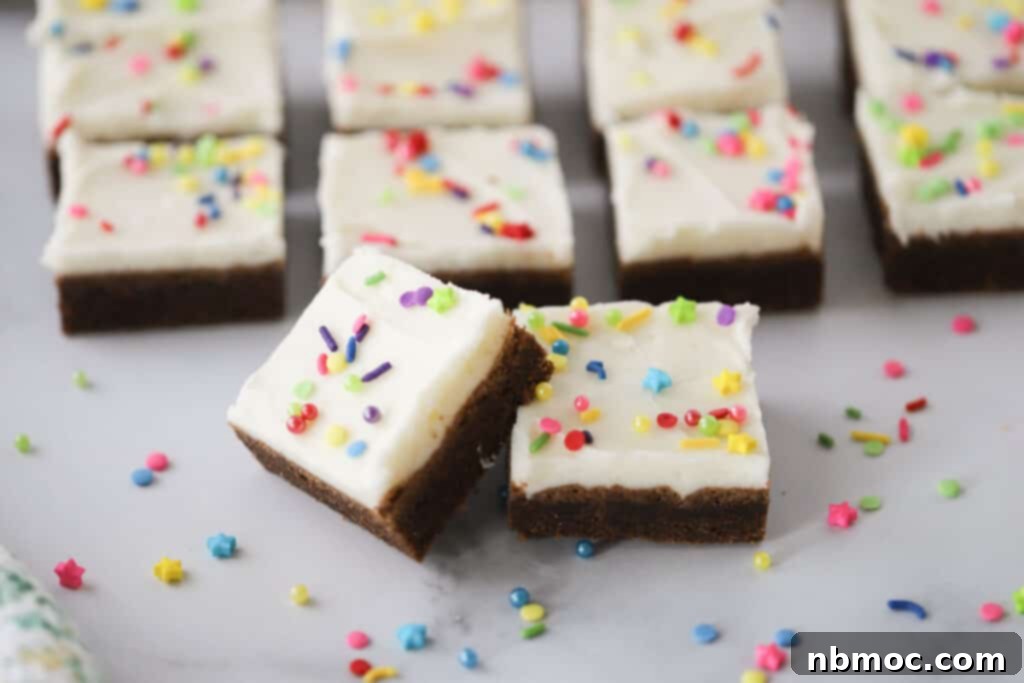 Fudgy Chocolate Cookie Bars 4 Chewy chocolate sugar cookie bars frosted with vanilla buttercream, chocolate cookie squares.