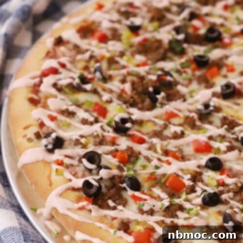 Fiesta Taco Pizza 6 taco pizza drizzled with salsa creamy sauce