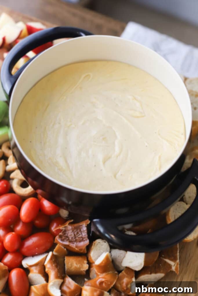 easy cheese fondue recipe in a dutch oven, cheese fondue easy.