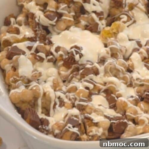 Marshmallow and peanut butter cereal bars in a white baking dish