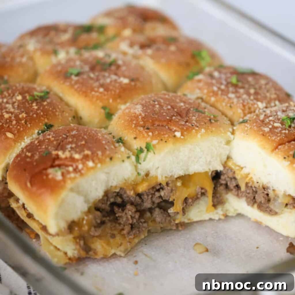 Cheeseburger sliders on a baking sheet, an easy Taylor Swift Super Bowl party recipe.