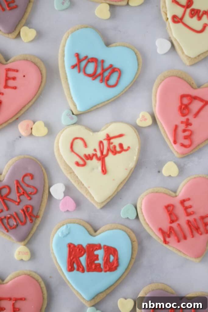 Taylor Swift Sugar cookies, rolled sugar cookies cut into hearts and decorated with royal icing and Swiftie phrases.
