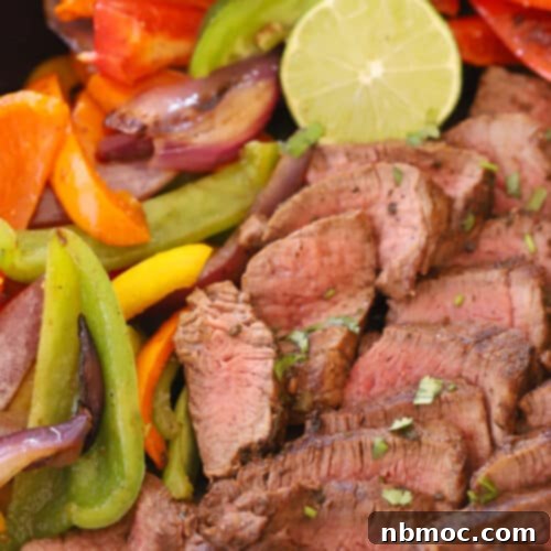 Sizzling Steak Fajitas 7 steak fajita in a cast iron skillet