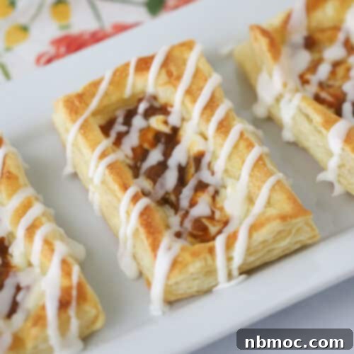 How to make Pumpkin Puff pastry bites recipe, finished and glazed.