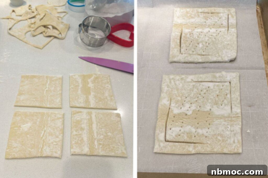 Puff pastry squares on a baking sheet, lightly scored at opposing corners, ready for the apple filling.