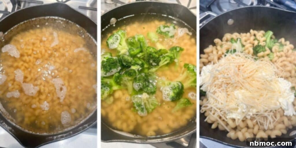 A process shot showing how to add creamy sauce to cooked pasta and broccoli in a large pan.