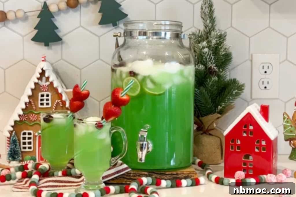 Grinch's Green Punch 5 Green Grinch holiday punch on a table with Christmas decorations.