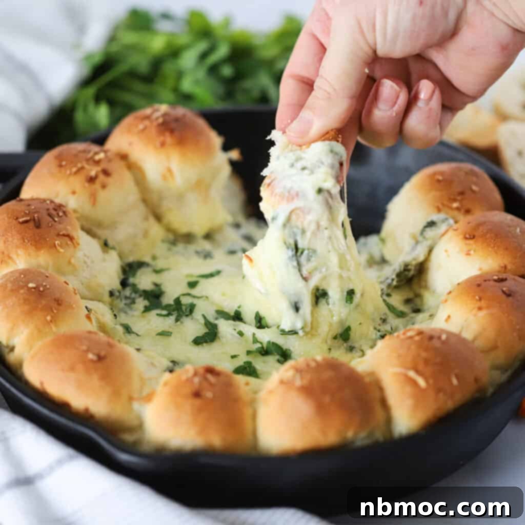 Spinach dip bread ring appetizer for the holidays.